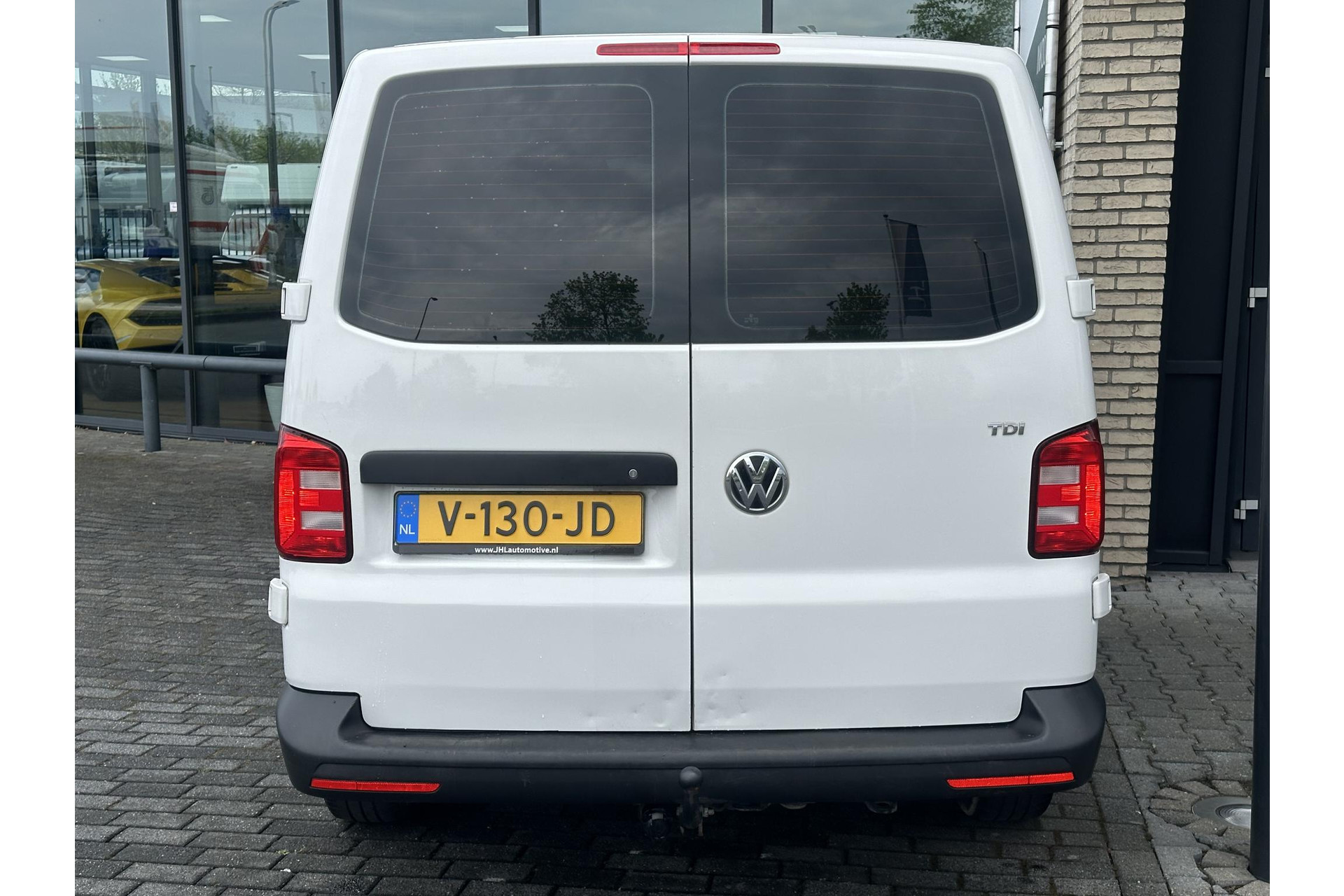 Volkswagen Transporter 2.0 TDI L2H1*AIRCO*NAVI*BLUETOOTH*HAAK*BETIMMERING